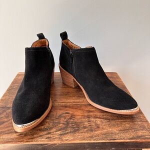 Dolce Vita size 8 black suede stack heel bootie with metal toe accent.